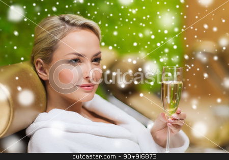 To use this stock image in your creative project, please select the size you need over to the right and click the "Add to Cart" button.
Your downloaded image will come with the Cutcaster watermark removed so don’t worry about the watermark you see on this page. beautiful young woman drinking champagne at spa stock photo, people, beauty, lifestyle, holidays and relaxation concept - beautiful young woman in white bath robe lying on chaise-longue and drinking champagne at spa with snow effect by Syda Productions