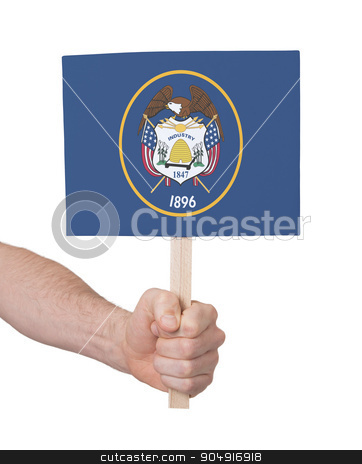 To use this stock image in your creative project, please select the size you need over to the right and click the "Add to Cart" button.
Your downloaded image will come with the Cutcaster watermark removed so don’t worry about the watermark you see on this page. Hand holding small card - Flag of Utah stock photo, Hand holding small card, isolated on white - Flag of Utah by michaklootwijk