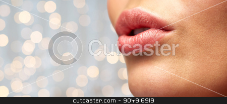To use this stock image in your creative project, please select the size you need over to the right and click the "Add to Cart" button.
Your downloaded image will come with the Cutcaster watermark removed so don’t worry about the watermark you see on this page. close up of young woman lips over holidays lights stock photo, beauty, people, make-up and plastic surgery concept - close up of young woman lips over holidays lights background by Syda Productions