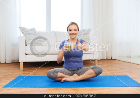 To use this stock image in your creative project, please select the size you need over to the right and click the "Add to Cart" button.
Your downloaded image will come with the Cutcaster watermark removed so don’t worry about the watermark you see on this page. woman with smoothie showing thumbs up at home stock photo, fitness, sport, people, diet and healthy lifestyle concept - happy woman with cup of smoothie sitting on mat at home and showing thumbs up by Syda Productions