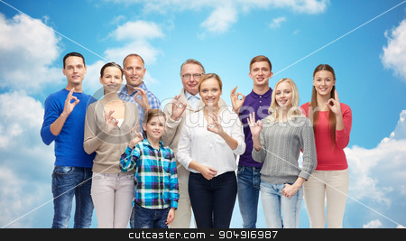 To use this stock image in your creative project, please select the size you need over to the right and click the "Add to Cart" button.
Your downloaded image will come with the Cutcaster watermark removed so don’t worry about the watermark you see on this page. group of smiling people showing ok hand sign stock photo, gesture, family, generation and people concept - group of smiling men, women and boy showing ok hand sign over blue sky and clouds background by Syda Productions