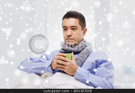 To use this stock image in your creative project, please select the size you need over to the right and click the "Add to Cart" button.
Your downloaded image will come with the Cutcaster watermark removed so don’t worry about the watermark you see on this page. ill man with flu drinking hot tea from cup at home stock photo, health care, people, winter and medicine concept - ill man with flu drinking hot tea from cup at home over snow effect by Syda Productions