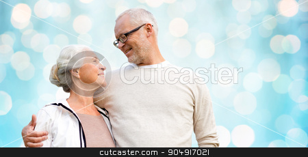 To use this stock image in your creative project, please select the size you need over to the right and click the "Add to Cart" button.
Your downloaded image will come with the Cutcaster watermark removed so don’t worry about the watermark you see on this page. happy senior couple over blue holidays lights stock photo, family, old age, love and people concept - happy senior couple over blue holidays lights background by Syda Productions