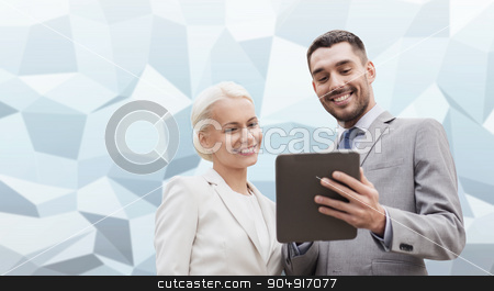 To use this stock image in your creative project, please select the size you need over to the right and click the "Add to Cart" button.
Your downloaded image will come with the Cutcaster watermark removed so don’t worry about the watermark you see on this page. smiling businessmen with tablet pc outdoors stock photo, business, partnership, technology and people concept - smiling businessman and businesswoman with tablet pc computer over gray blue graphic low poly background by Syda Productions