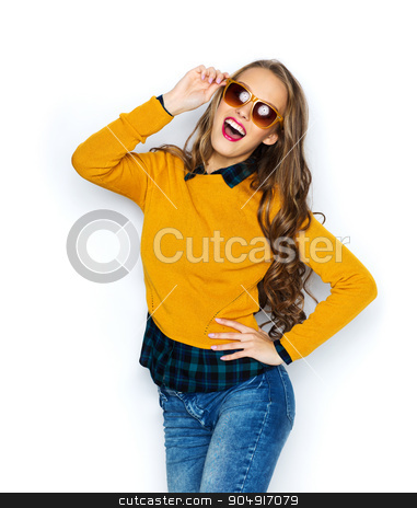To use this stock image in your creative project, please select the size you need over to the right and click the "Add to Cart" button.
Your downloaded image will come with the Cutcaster watermark removed so don’t worry about the watermark you see on this page. happy young woman or teen girl in casual clothes stock photo, people, style and fashion concept - happy young woman or teen girl in casual clothes and sunglasses having fun by Syda Productions