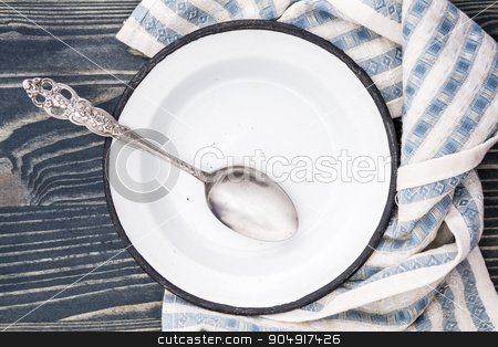 To use this stock image in your creative project, please select the size you need over to the right and click the "Add to Cart" button.
Your downloaded image will come with the Cutcaster watermark removed so don’t worry about the watermark you see on this page. Empty White Enamel Plate Wrapped with Napkin stock photo, Empty white enamel plate wrapped with napkin and spoon on blue wooden by OZMedia