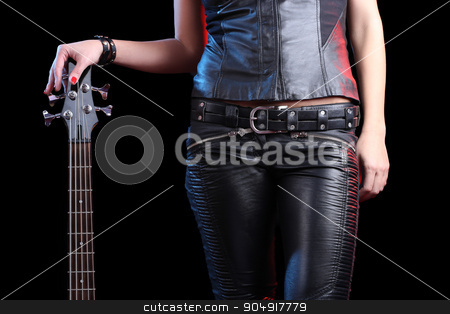 To use this stock image in your creative project, please select the size you need over to the right and click the "Add to Cart" button.
Your downloaded image will come with the Cutcaster watermark removed so don’t worry about the watermark you see on this page. Sexy girl in leather clothes with bass guitar stock photo, Sexy girl in leather clothes with bass guitar. rock by Kopytin Georgy