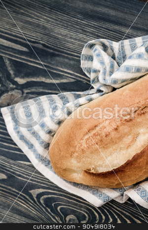 To use this stock image in your creative project, please select the size you need over to the right and click the "Add to Cart" button.
Your downloaded image will come with the Cutcaster watermark removed so don’t worry about the watermark you see on this page. Turkish Bread Consumed by Most of the Turkish People stock photo, Turkish bread consumed by most of the Turkish people on napkin and blue wooden background by OZMedia