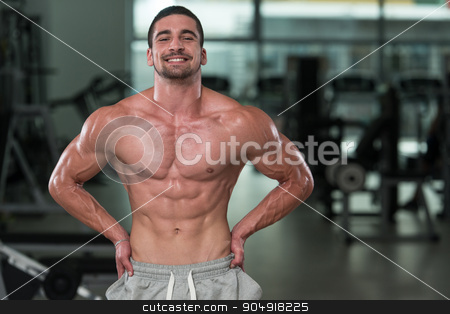 To use this stock image in your creative project, please select the size you need over to the right and click the "Add to Cart" button.
Your downloaded image will come with the Cutcaster watermark removed so don’t worry about the watermark you see on this page. Detail Of A Bodybuilder Posing In The Gym stock photo, Awesome Bodybuilder Showing His Muscles And Posing In Gym by Jasminko Ibrakovic