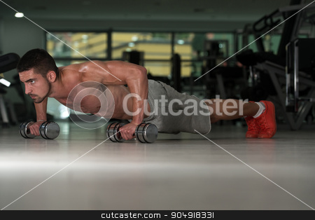 To use this stock image in your creative project, please select the size you need over to the right and click the "Add to Cart" button.
Your downloaded image will come with the Cutcaster watermark removed so don’t worry about the watermark you see on this page. Push Ups With Dumbbels stock photo, Young Athlete Doing Pushups With Dumbbells As Part Of Bodybuilding Training by Jasminko Ibrakovic