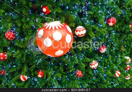 To use this stock image in your creative project, please select the size you need over to the right and click the "Add to Cart" button.
Your downloaded image will come with the Cutcaster watermark removed so don’t worry about the watermark you see on this page. red ball and light bulb on pine tree stock photo, red ball and light bulb were decorated on pine tree on Christmas day in Thailand by stockdevil