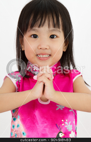 To use this stock image in your creative project, please select the size you need over to the right and click the "Add to Cart" button.
Your downloaded image will come with the Cutcaster watermark removed so don’t worry about the watermark you see on this page. Chinese Little Girl wearing Cheongsam with greeting gesture stock photo, Chinese Little Girl wearing Cheongsam with greeting gesture in plain white background. by Tan Kian Khoon