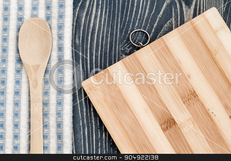 To use this stock image in your creative project, please select the size you need over to the right and click the "Add to Cart" button.
Your downloaded image will come with the Cutcaster watermark removed so don’t worry about the watermark you see on this page. Wooden Spoon on Napkin, Chopping Board and Blue Wooden Backgroun stock photo, Wooden spoon on napkin, chopping board on blue wooden background by OZMedia