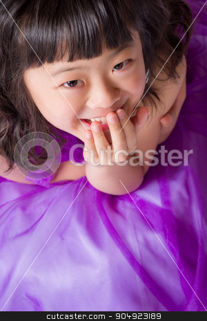 To use this stock image in your creative project, please select the size you need over to the right and click the "Add to Cart" button.
Your downloaded image will come with the Cutcaster watermark removed so don’t worry about the watermark you see on this page. Young Japanese Girl Portrait stock photo, A portrait of a cute, happy and young Japanese girl in a purple dress. by Scott Dumas