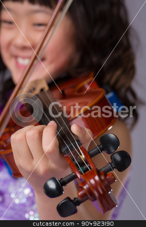 To use this stock image in your creative project, please select the size you need over to the right and click the "Add to Cart" button.
Your downloaded image will come with the Cutcaster watermark removed so don’t worry about the watermark you see on this page. Young Japanese Girl Portrait with Violin stock photo, A portrait of a cute, happy and young Japanese girl in a purple dress with a violin with the focus on her hand instead of her face. by Scott Dumas