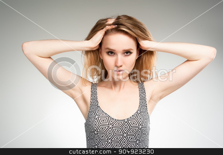 To use this stock image in your creative project, please select the size you need over to the right and click the "Add to Cart" button.
Your downloaded image will come with the Cutcaster watermark removed so don’t worry about the watermark you see on this page. Attractive sad woman over white stock photo, Young beautiful fashionable deplorable model in gymnastic suit over white background by Aikon
