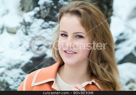 To use this stock image in your creative project, please select the size you need over to the right and click the "Add to Cart" button.
Your downloaded image will come with the Cutcaster watermark removed so don’t worry about the watermark you see on this page. Winter portrait of the girl. stock photo, Winter portrait of the girl. a bright orange coat. by oleksandrmasnyi