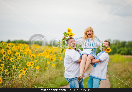 To use this stock image in your creative project, please select the size you need over to the right and click the "Add to Cart" button.
Your downloaded image will come with the Cutcaster watermark removed so don’t worry about the watermark you see on this page. Happy family having fun on sunflowers stock photo, Happy family having fun on sunflowers by Andrii Shevchuk
