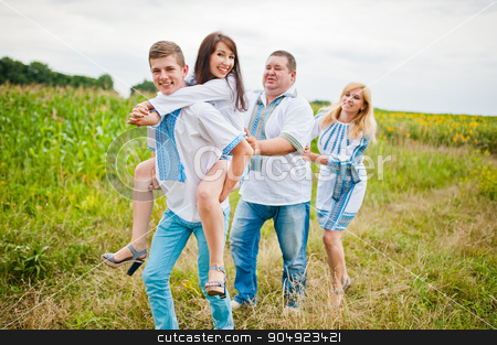 To use this stock image in your creative project, please select the size you need over to the right and click the "Add to Cart" button.
Your downloaded image will come with the Cutcaster watermark removed so don’t worry about the watermark you see on this page. Happy family having fun on field stock photo, Happy family having fun on field by Andrii Shevchuk