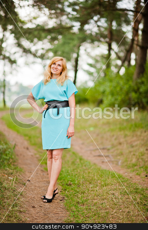 To use this stock image in your creative project, please select the size you need over to the right and click the "Add to Cart" button.
Your downloaded image will come with the Cutcaster watermark removed so don’t worry about the watermark you see on this page. Adult blonde woman posed at pine forest stock photo, Adult blonde woman posed at pine forest by Andrii Shevchuk