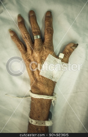To use this stock image in your creative project, please select the size you need over to the right and click the "Add to Cart" button.
Your downloaded image will come with the Cutcaster watermark removed so don’t worry about the watermark you see on this page. hand of old patient with plug on bed in hospital stock photo, hand of old patient with plug on bed in hospital (vignette style) by stockdevil
