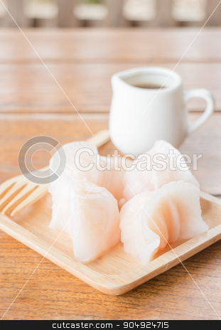 To use this stock image in your creative project, please select the size you need over to the right and click the "Add to Cart" button.
Your downloaded image will come with the Cutcaster watermark removed so don’t worry about the watermark you see on this page. Chinese har gao dim sum dumplings on wooden plate stock photo, Chinese har gao dim sum dumplings on wooden plate, stock photo by nalinratphi