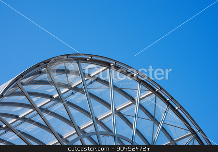 To use this stock image in your creative project, please select the size you need over to the right and click the "Add to Cart" button.
Your downloaded image will come with the Cutcaster watermark removed so don’t worry about the watermark you see on this page. Architectural Details of a Glass and Steel Building stock photo, Detail of steel and glass roof of a modern building with blue clear sky by catalby