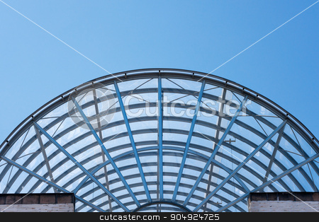 To use this stock image in your creative project, please select the size you need over to the right and click the "Add to Cart" button.
Your downloaded image will come with the Cutcaster watermark removed so don’t worry about the watermark you see on this page. Architectural Details of a Glass and Steel Building stock photo, Detail of steel and glass roof of a modern building with blue clear sky by catalby