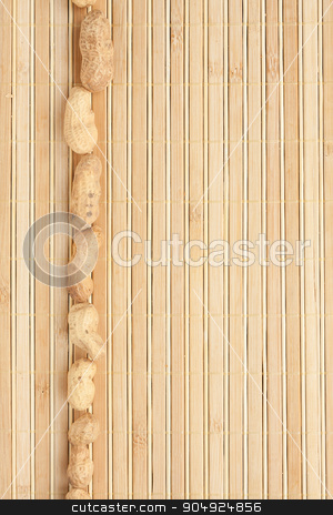 To use this stock image in your creative project, please select the size you need over to the right and click the "Add to Cart" button.
Your downloaded image will come with the Cutcaster watermark removed so don’t worry about the watermark you see on this page. Cases a band of peanut lying on bamboo mat stock photo, Cases a band of peanut lying on bamboo mat, as background by alekleks