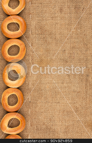 To use this stock image in your creative project, please select the size you need over to the right and click the "Add to Cart" button.
Your downloaded image will come with the Cutcaster watermark removed so don’t worry about the watermark you see on this page. Bagels are on burlap stock photo, Bagels are on burlap with space for text by alekleks