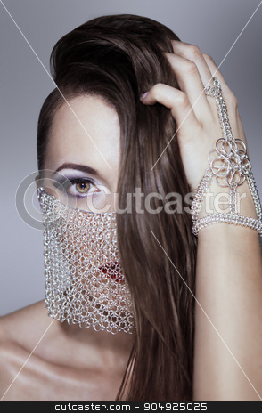 To use this stock image in your creative project, please select the size you need over to the right and click the "Add to Cart" button.
Your downloaded image will come with the Cutcaster watermark removed so don’t worry about the watermark you see on this page. Fashion warrior queen stock photo, Beauty portrait of a girl with a chain veil by Viacheslav