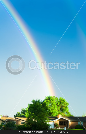 To use this stock image in your creative project, please select the size you need over to the right and click the "Add to Cart" button.
Your downloaded image will come with the Cutcaster watermark removed so don’t worry about the watermark you see on this page. Rainbow 2 is coming through stock photo, Two rainbows filling the sky above a house after a light rain by Daniel Stewart