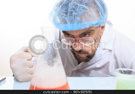 To use this stock image in your creative project, please select the size you need over to the right and click the "Add to Cart" button.
Your downloaded image will come with the Cutcaster watermark removed so don’t worry about the watermark you see on this page. Mad chemist in the lab doing reaction stock photo, Mad chemist in the lab doing reaction - studio shoot by Kopytin Georgy