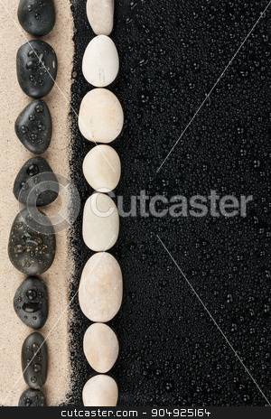 To use this stock image in your creative project, please select the size you need over to the right and click the "Add to Cart" button.
Your downloaded image will come with the Cutcaster watermark removed so don’t worry about the watermark you see on this page. Black and white Zen stones on sand and water drops stock photo, Black and white Zen stones on sand and water drops, with space for text by alekleks