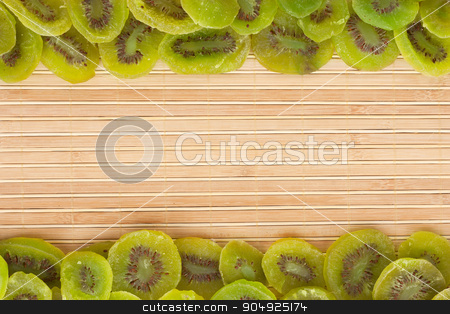 To use this stock image in your creative project, please select the size you need over to the right and click the "Add to Cart" button.
Your downloaded image will come with the Cutcaster watermark removed so don’t worry about the watermark you see on this page. Dried kiwi lying on a bamboo mat stock photo, Dried kiwi lying on a bamboo mat, as background by alekleks