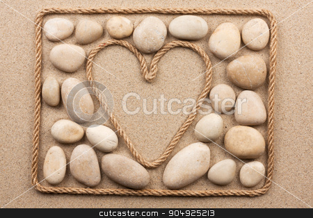 To use this stock image in your creative project, please select the size you need over to the right and click the "Add to Cart" button.
Your downloaded image will come with the Cutcaster watermark removed so don’t worry about the watermark you see on this page. Beautiful frame of rope in the form of heart with white stones stock photo, Beautiful frame of rope in the form of heart with white stones, on the sand by alekleks