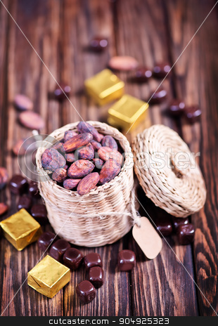 To use this stock image in your creative project, please select the size you need over to the right and click the "Add to Cart" button.
Your downloaded image will come with the Cutcaster watermark removed so don’t worry about the watermark you see on this page. cocoa beans stock photo, cocoa on the wooden table, cocoa beans by tycoon