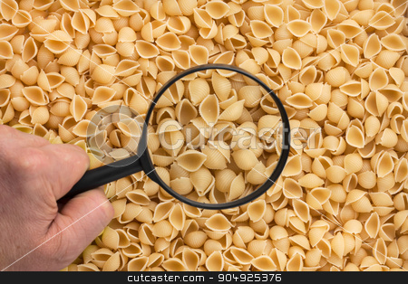 To use this stock image in your creative project, please select the size you need over to the right and click the "Add to Cart" button.
Your downloaded image will come with the Cutcaster watermark removed so don’t worry about the watermark you see on this page. Human hand holding a magnifying glass over the pasta stock photo, Human hand holding a magnifying glass over the pasta can be used as background by alekleks