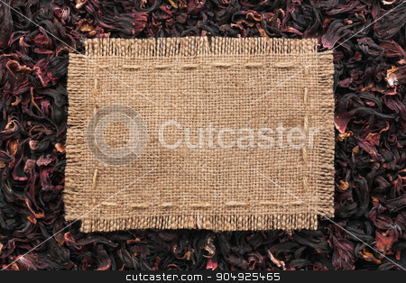 To use this stock image in your creative project, please select the size you need over to the right and click the "Add to Cart" button.
Your downloaded image will come with the Cutcaster watermark removed so don’t worry about the watermark you see on this page. Frame made of burlap with the line lies on hibiscus stock photo, Frame made of burlap with the line lies on hibiscus, with place for your text by alekleks