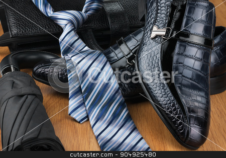 To use this stock image in your creative project, please select the size you need over to the right and click the "Add to Cart" button.
Your downloaded image will come with the Cutcaster watermark removed so don’t worry about the watermark you see on this page. Classic mens shoes, tie, umbrella and bag on the wooden floor stock photo, Classic mens shoes, tie, umbrella and bag on the wooden floor, can be used as background by alekleks