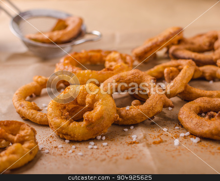 To use this stock image in your creative project, please select the size you need over to the right and click the "Add to Cart" button.
Your downloaded image will come with the Cutcaster watermark removed so don’t worry about the watermark you see on this page. Onion rings with chili on top stock photo, Onion rings with chili on top, delicious, very simple homemade by Peteer