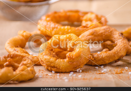 To use this stock image in your creative project, please select the size you need over to the right and click the "Add to Cart" button.
Your downloaded image will come with the Cutcaster watermark removed so don’t worry about the watermark you see on this page. Onion rings with chili on top stock photo, Onion rings with chili on top, delicious, very simple homemade by Peteer