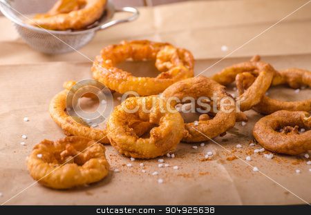 To use this stock image in your creative project, please select the size you need over to the right and click the "Add to Cart" button.
Your downloaded image will come with the Cutcaster watermark removed so don’t worry about the watermark you see on this page. Onion rings with chili on top stock photo, Onion rings with chili on top, delicious, very simple homemade by Peteer