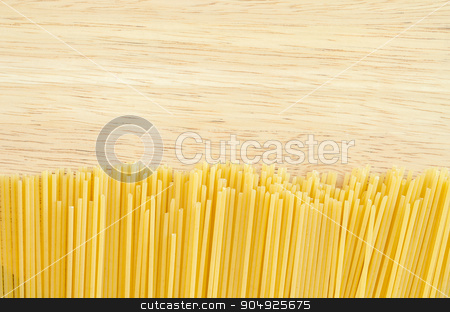 To use this stock image in your creative project, please select the size you need over to the right and click the "Add to Cart" button.
Your downloaded image will come with the Cutcaster watermark removed so don’t worry about the watermark you see on this page. Raw spaghetti on wooden. stock photo, Raw spaghetti on wooden background. by Miss. PENCHAN PUMILA