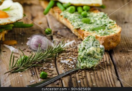 To use this stock image in your creative project, please select the size you need over to the right and click the "Add to Cart" button.
Your downloaded image will come with the Cutcaster watermark removed so don’t worry about the watermark you see on this page. Baguette with herb butter stock photo, Healthy rustic baguette with herb butter and vegetables by Peteer