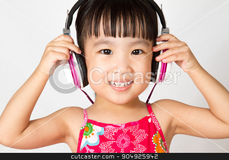 To use this stock image in your creative project, please select the size you need over to the right and click the "Add to Cart" button.
Your downloaded image will come with the Cutcaster watermark removed so don’t worry about the watermark you see on this page. Chinese little girl on headphones stock photo, Chinese little girl on headphones smile with plain white isolated background. by Tan Kian Khoon