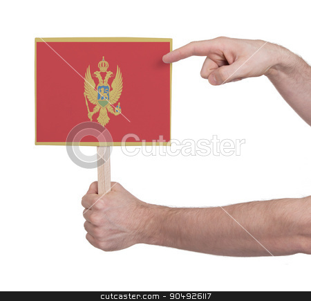 To use this stock image in your creative project, please select the size you need over to the right and click the "Add to Cart" button.
Your downloaded image will come with the Cutcaster watermark removed so don’t worry about the watermark you see on this page. Hand holding small card - Flag of Montenegro stock photo, Hand holding small card, isolated on white - Flag of Montenegro by michaklootwijk