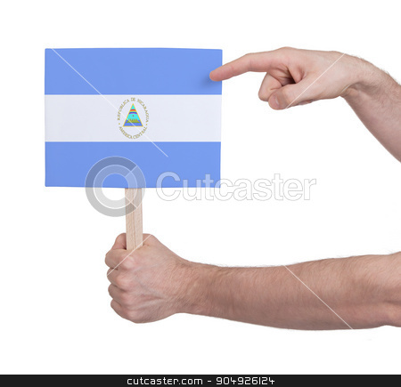 To use this stock image in your creative project, please select the size you need over to the right and click the "Add to Cart" button.
Your downloaded image will come with the Cutcaster watermark removed so don’t worry about the watermark you see on this page. Hand holding small card - Flag of Nicaragua stock photo, Hand holding small card, isolated on white - Flag of Nicaragua by michaklootwijk