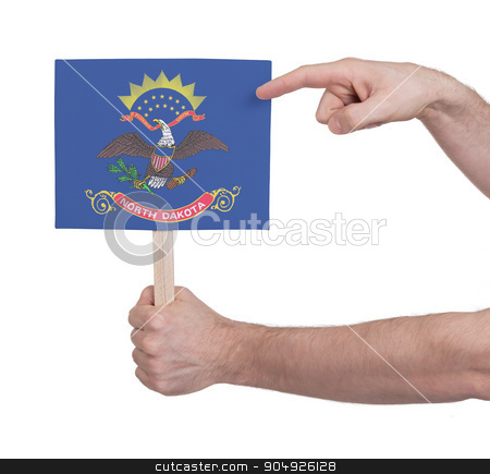 To use this stock image in your creative project, please select the size you need over to the right and click the "Add to Cart" button.
Your downloaded image will come with the Cutcaster watermark removed so don’t worry about the watermark you see on this page. Hand holding small card - Flag of North Dakota stock photo, Hand holding small card, isolated on white - Flag of North Dakota by michaklootwijk