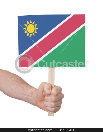 To use this stock image in your creative project, please select the size you need over to the right and click the "Add to Cart" button.
Your downloaded image will come with the Cutcaster watermark removed so don’t worry about the watermark you see on this page. Hand holding small card - Flag of Namibia stock photo, Hand holding small card, isolated on white - Flag of Namibia by michaklootwijk